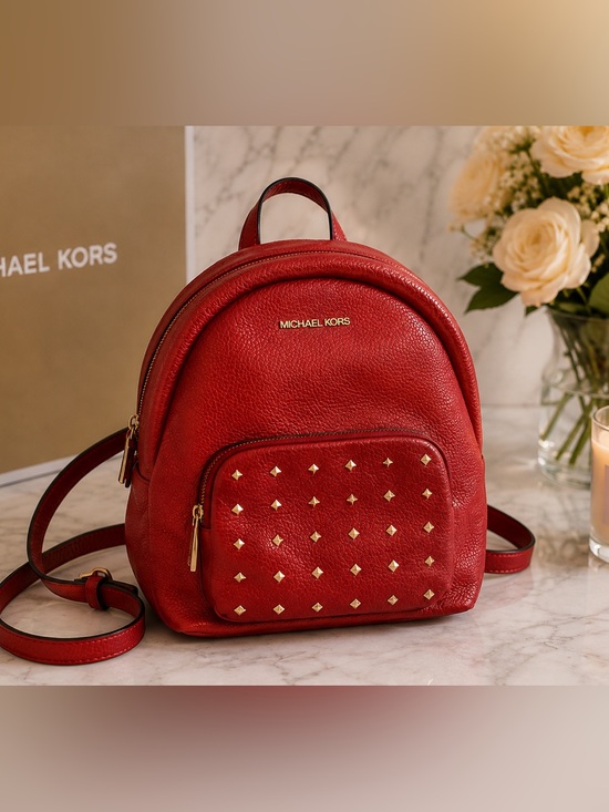 Michael Kors Handbags - Michael Kors Red Studded Leather Backpack